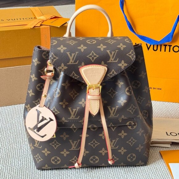 Louis Vuitton Dresses & Skirts - Louis Vuitton Handheld Bags, Chain Bags